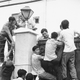 Scaling the US embassy gates.
